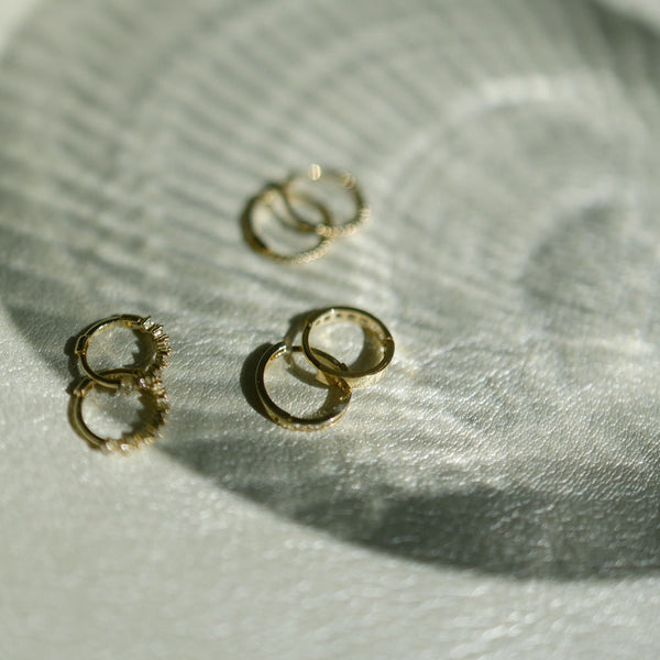 10k Solid Gold Channel CZ Huggie - - Earrings - Ofina