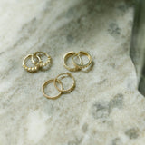 10k Solid Gold Channel CZ Huggie - - Earrings - Ofina