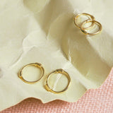 10k Solid Gold Thin Huggies - - Earrings - Ofina