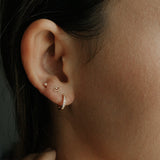 10k Solid Gold Channel CZ Huggie - - Earrings - Ofina