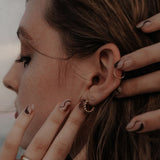 10k Solid Gold Croissant Huggie Studs - - Earrings - Ofina