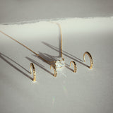 10k Solid Gold Black CZ Huggies - - Earrings - Ofina
