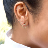 10k Solid Gold Twisted Huggie - - Earrings - Ofina
