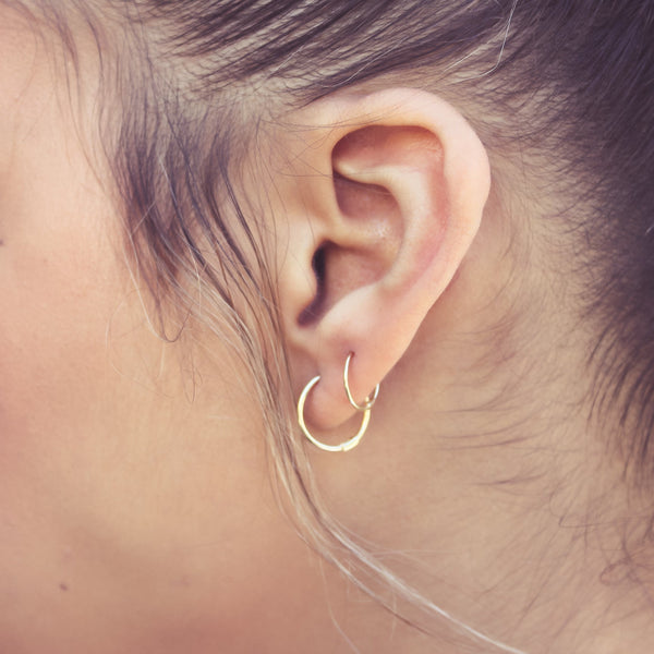 10k Solid Gold Thin Huggies -  - Earrings - Ofina