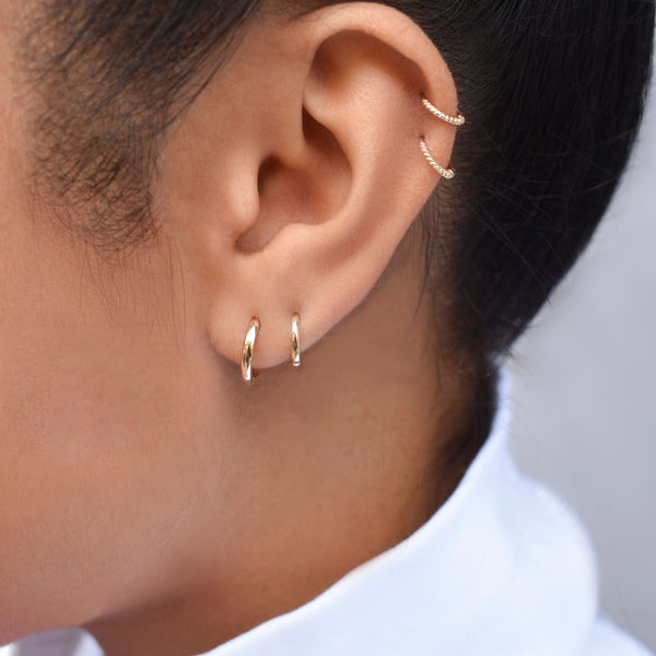 10k Solid Gold Twisted Huggie -  - Earrings - Ofina